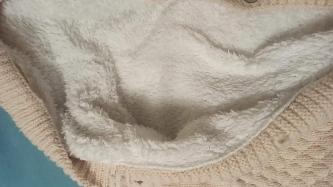 Вязанный комбинезон для новорожденных