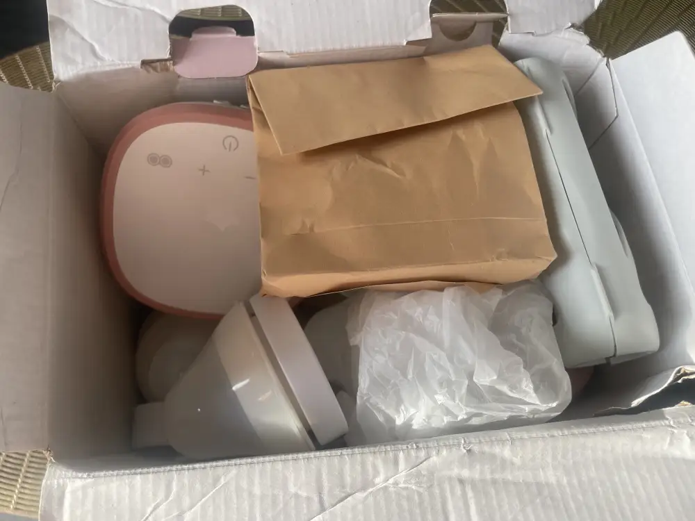 Молокоотсос  Tommee tippee