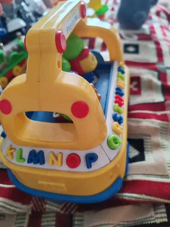 Машинка развивающиая