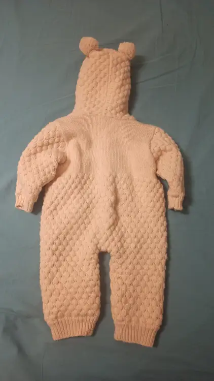Вязанный комбинезон для новорожденных
