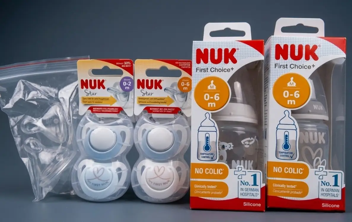 Бутылочки для кормления+дополнительные соски и пустышки фирмы NUK