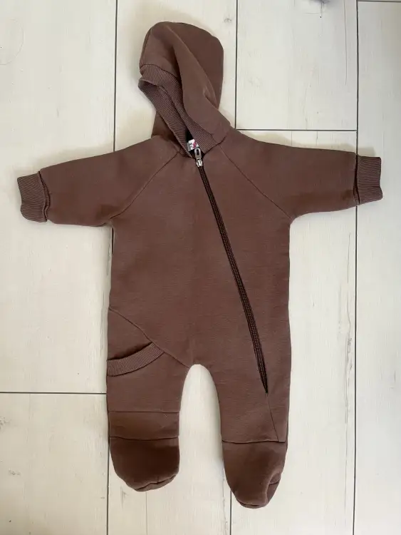 Новый комбинезон 62 см.