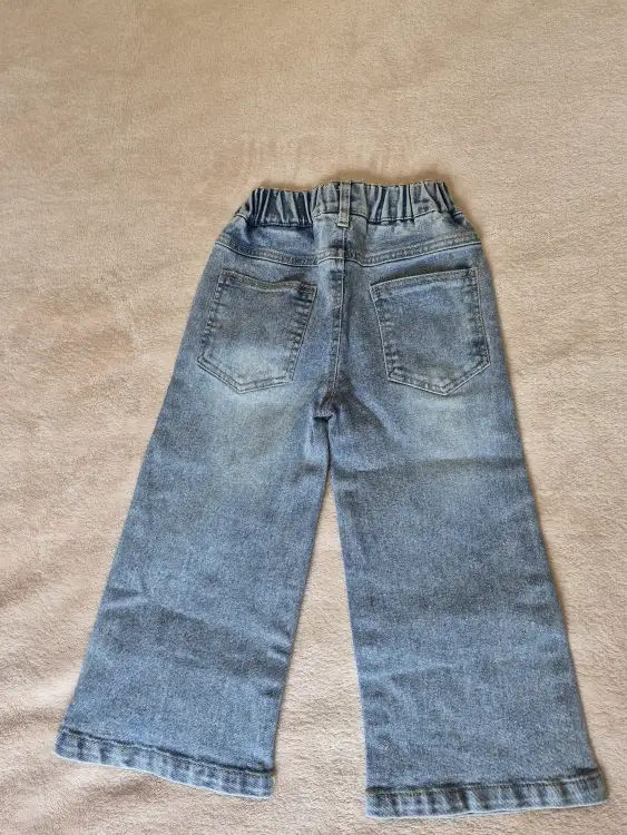Джинсы новые
