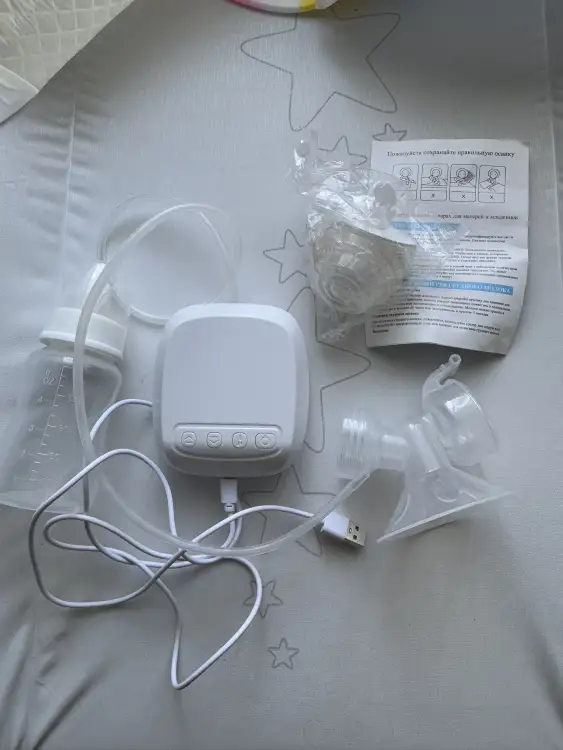 Электрический молокоотсос