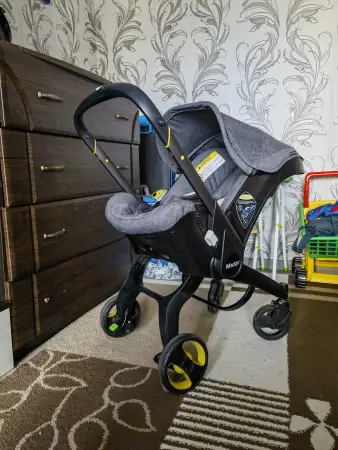 Коляска-автокресло (автолюлька)