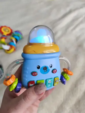 Музыкальная игрушка погремушка