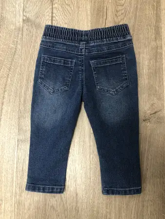 Джинсы новые