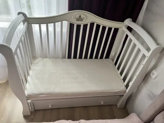 Детская кроватка маятник