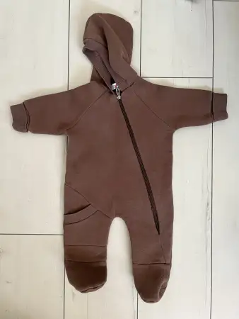 Новый комбинезон 62 см.