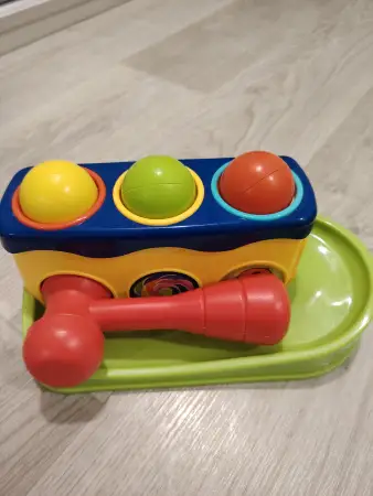 Игрушка стучалка