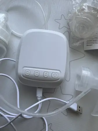 Электрический молокоотсос