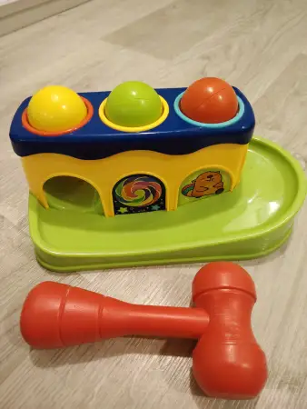 Игрушка стучалка